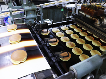 Rising during baking. Two pancakes are stuck together when removed.