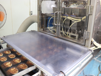 Cocoa powder topping is also automated.